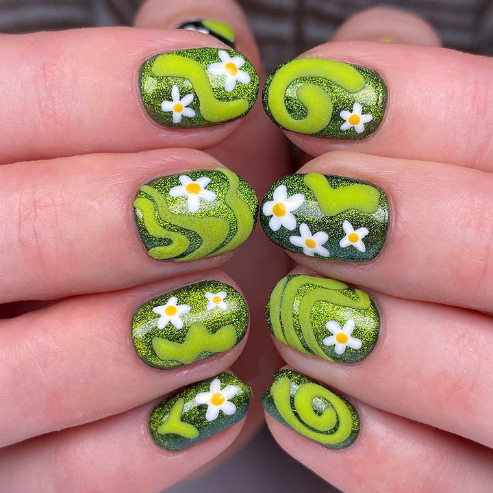 Artificial nails with floral and glittering accents Stornfield