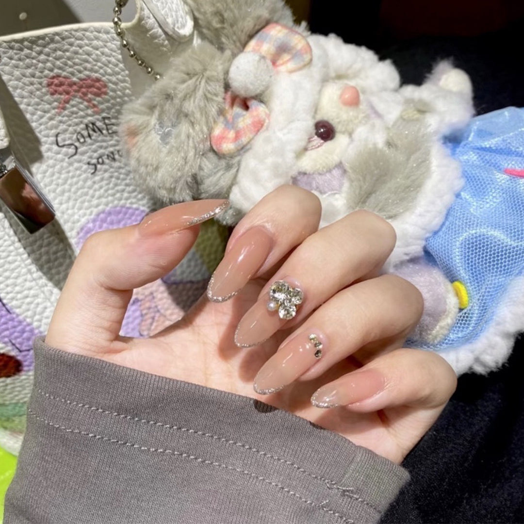Artful Nail Art with Rhinestone Embellishments Stornfield