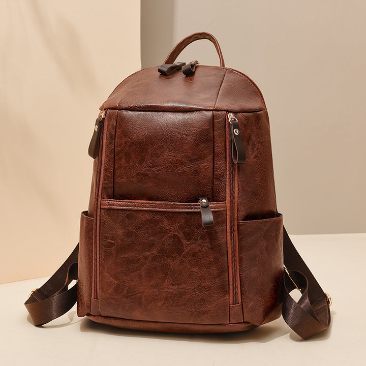 Elegant Multi-Compartt Faux Leather Backpack Stornfield