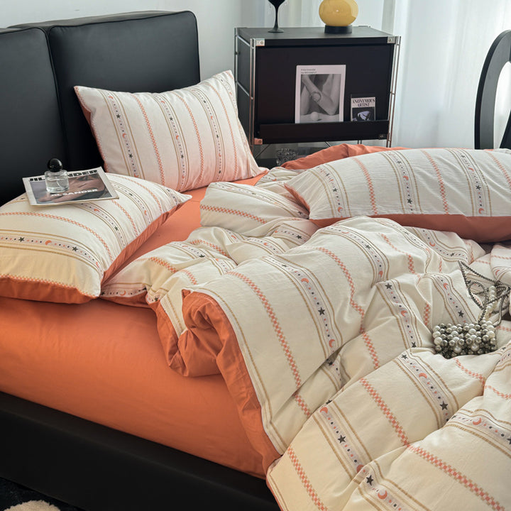 Striped cotton bedding set with washed finish, breathable percale & reversible function