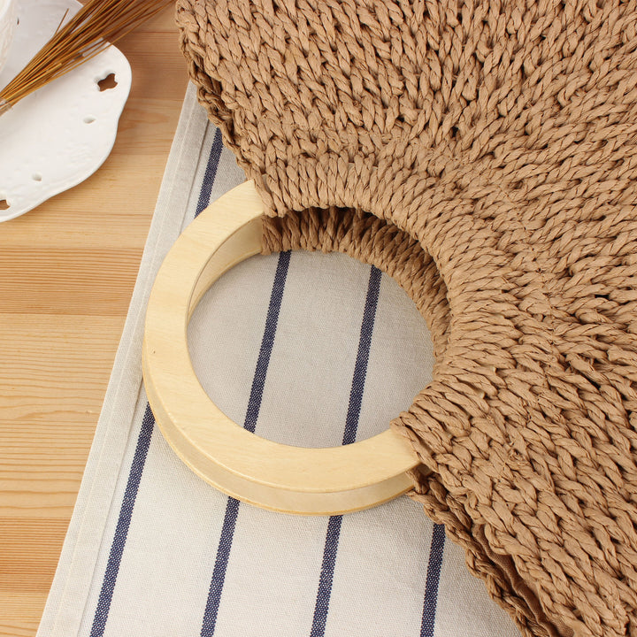 Designer bag made of hand-woven wicker with wooden handle Stornfield