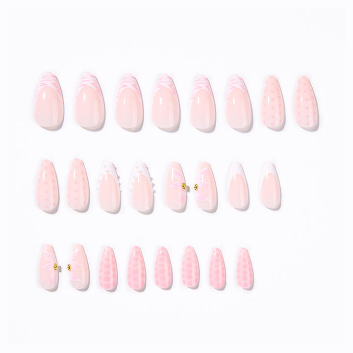 Artistic stiletto nails with elegant 3D decorations Stornfield