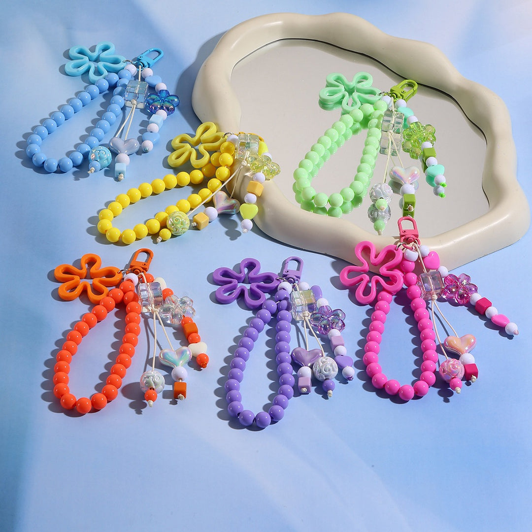 Playful keychain with flower and butterfly details Stornfield