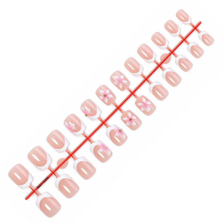 Artificial nail set with delicate floral designs Stornfield