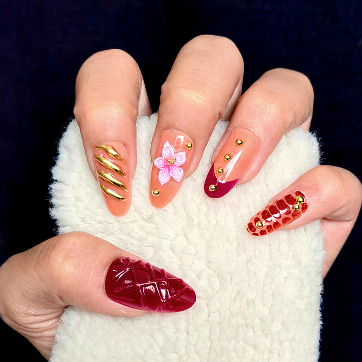 Decorative Nail Art Set with Floral and Metallic Accents Stornfield