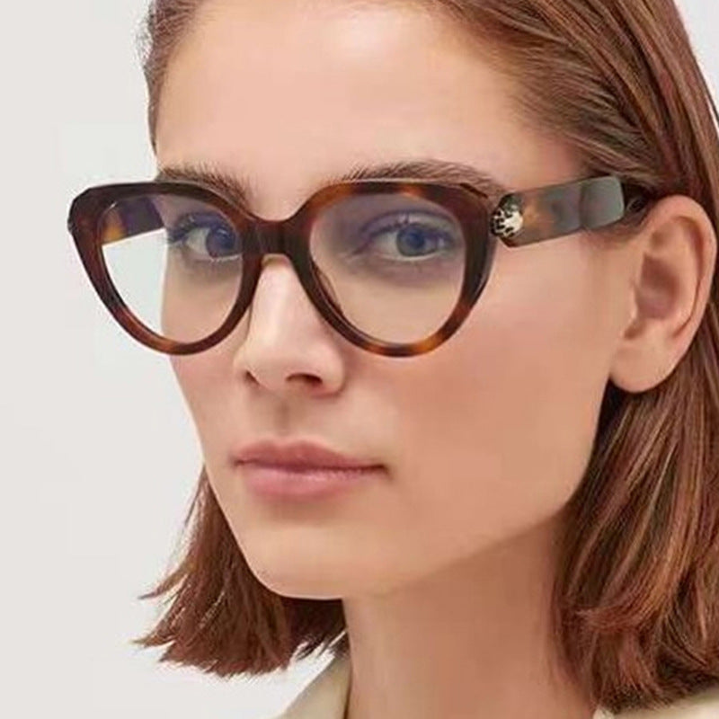 Ladies Cat-Eye Sunglasses with Golden Accents and Protective UV Filter Stornfield