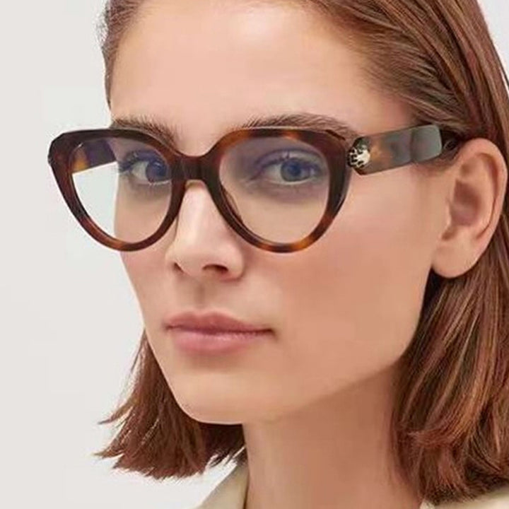 Ladies Cat-Eye Sunglasses with Golden Accents and Protective UV Filter Stornfield