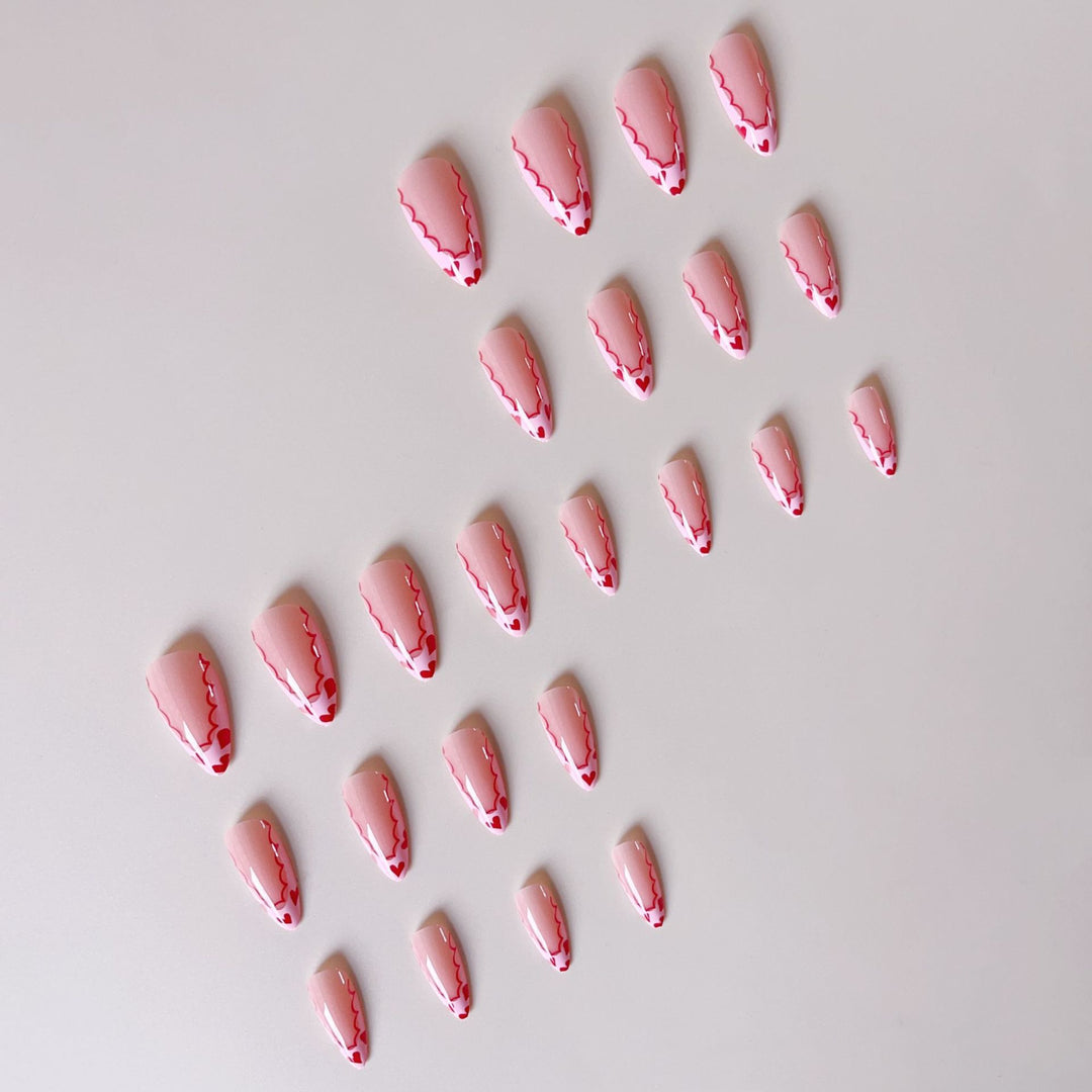 Acrylic nail set with elegant heart tips and creative accents Stornfield