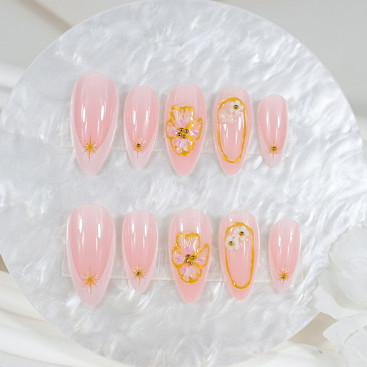 Artificial nail set with elegant floral and glamorous details Stornfield