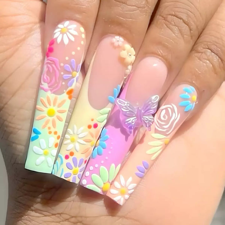 Artificial nails with floral patterns and 3D decorations Stornfield