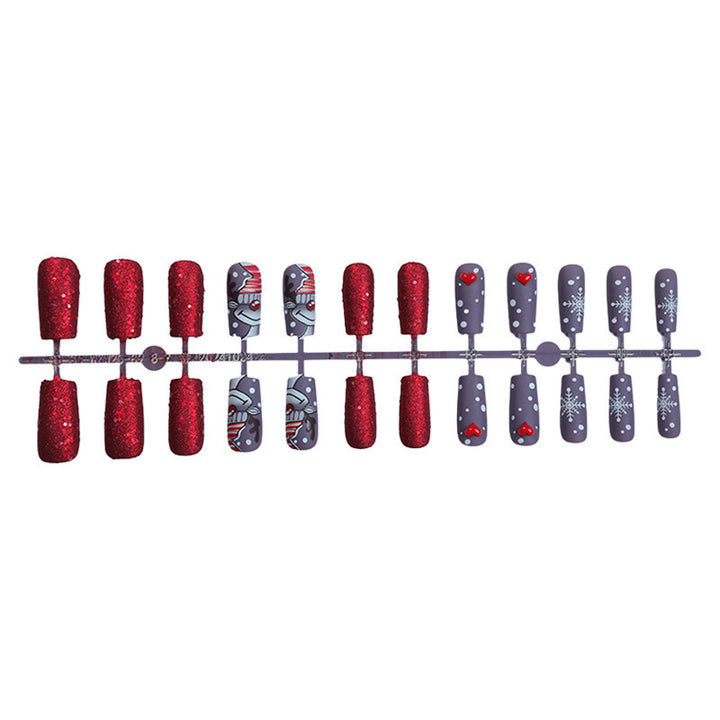 artful nail set with festive glitter and Christmas motifs Stornfield