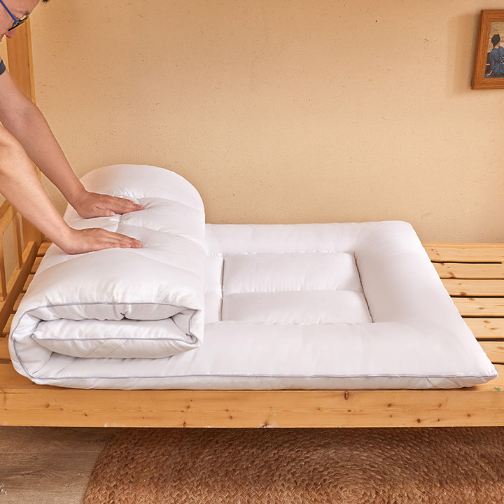 Japanese futon topper made of microfiber with triple foldable design and high point elasticity