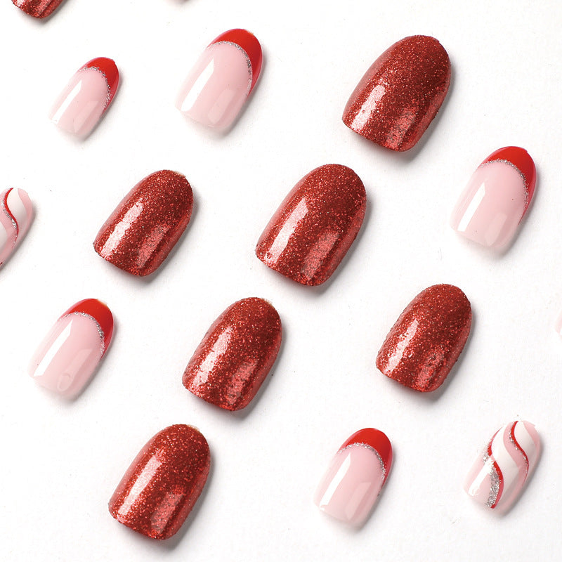 Artful Nail Extensions with Glitter and Wave Pattern Stornfield