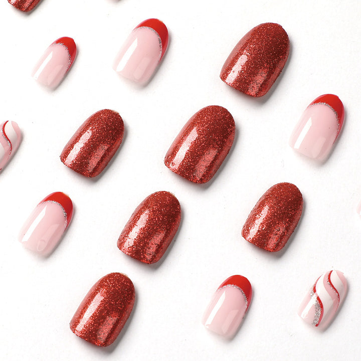 Artful Nail Extensions with Glitter and Wave Pattern Stornfield