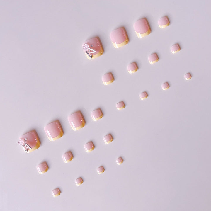 Artificial nail set with cheerful flower and glitter accents Stornfield