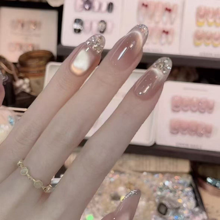 Elegant Nail Art Extensions with Pearl Accents Stornfield