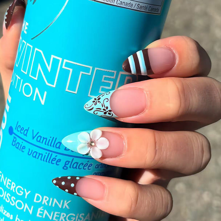Artificial nails with creative floral design and elegant accent colors Stornfield