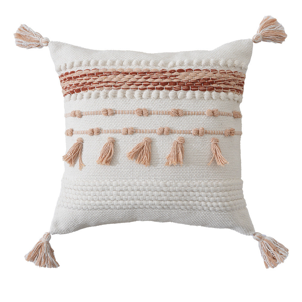 Structured decorative pillow with tufted diamonds, relief border, and corner tassels