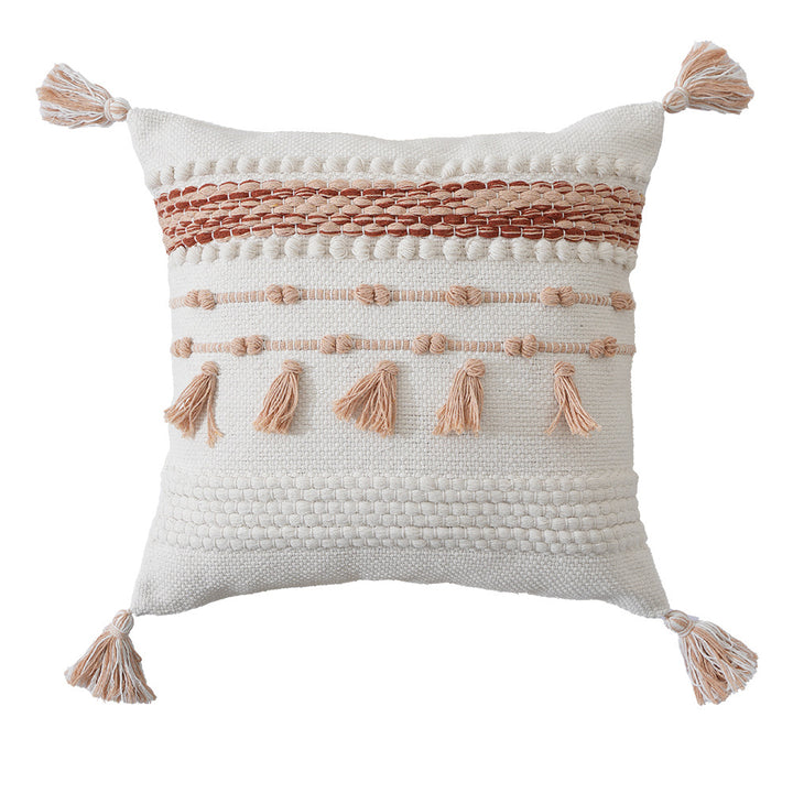 Structured decorative pillow with tufted diamonds, relief border, and corner tassels