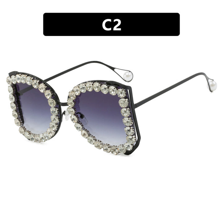 Women's extravagant cat-eye sunglasses with sparkling rhinestone frame Stornfield