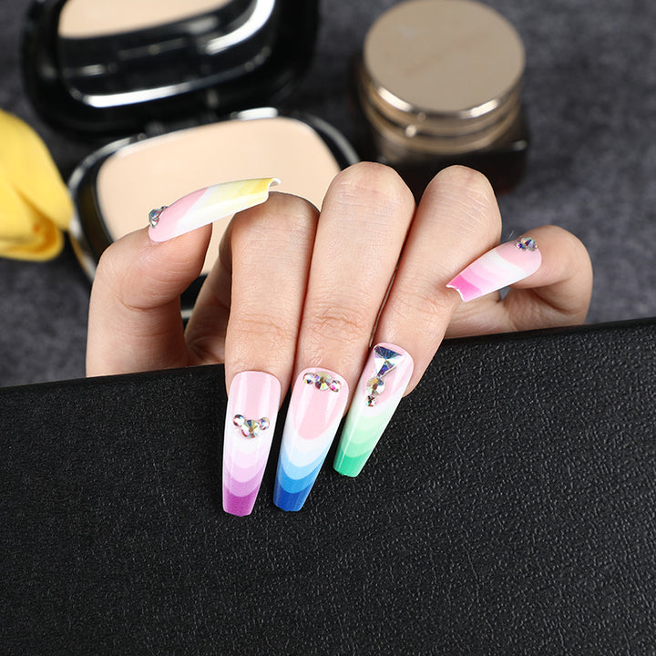 Artificial nails in luxurious ombre design with rhinestone accents Stornfield