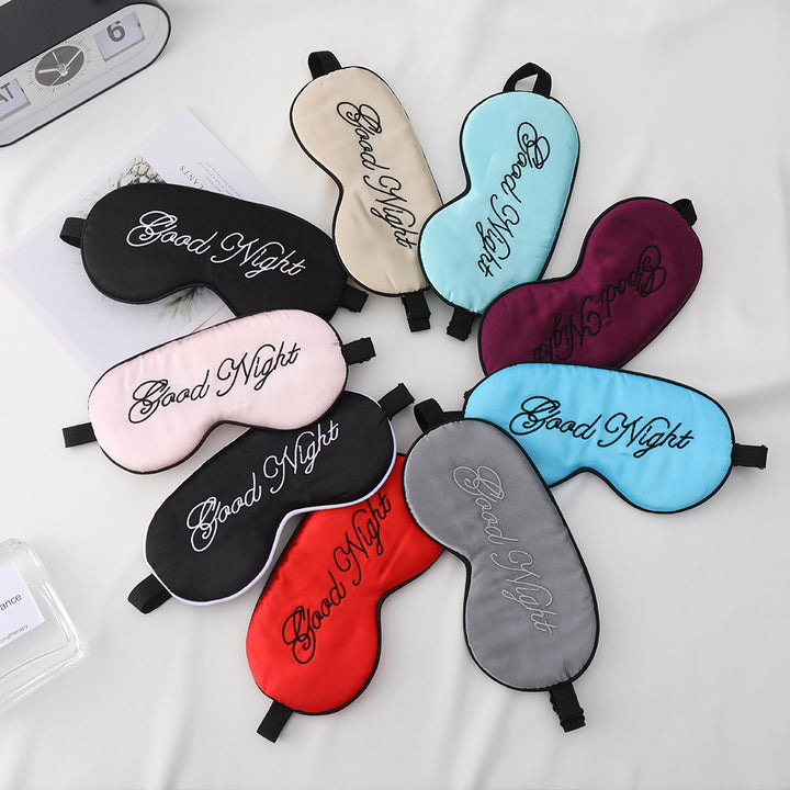 Unisex embroidered contoured sleep mask with decorative text embroidery and adjustable elastic band Stornfield