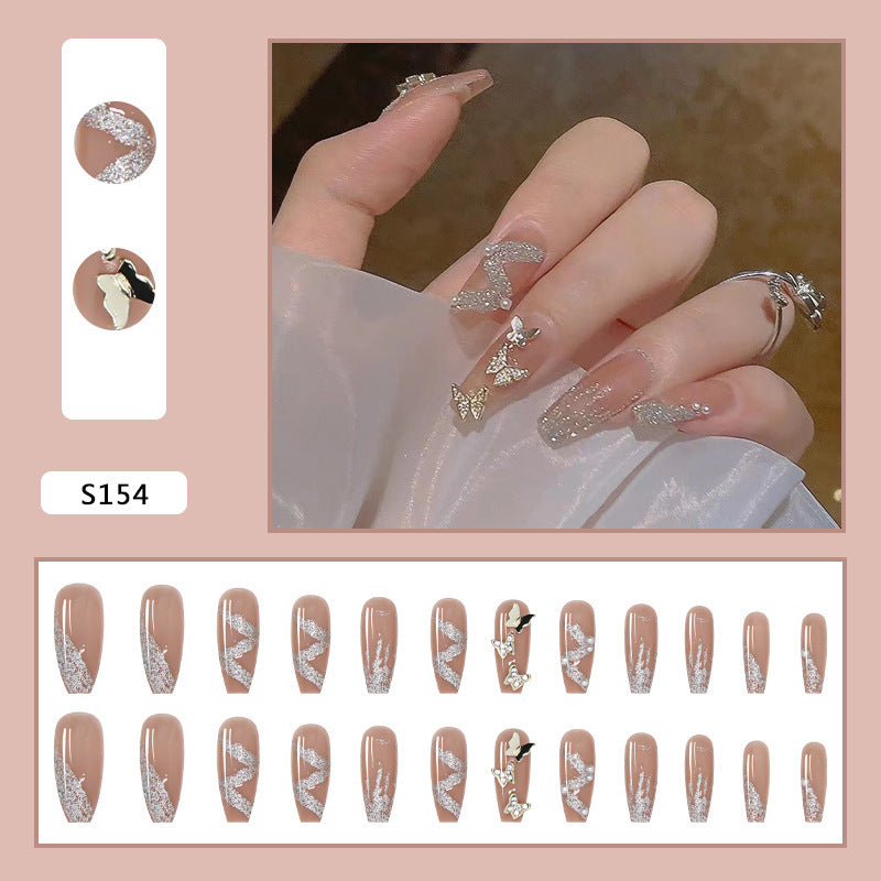 Artificial nails with sparkling rhinestone and butterfly design Stornfield