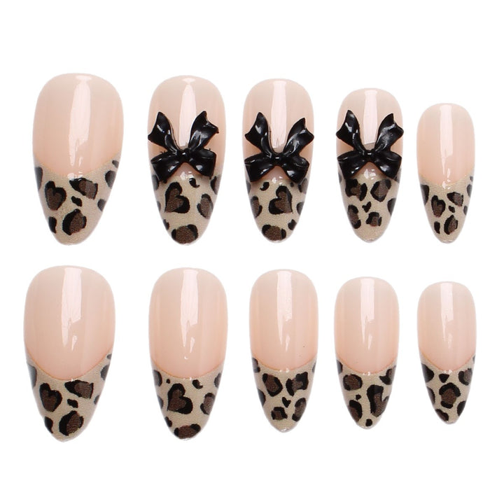 Artistic Press-On Nail Set with Leopard Print and Bow Accents Stornfield