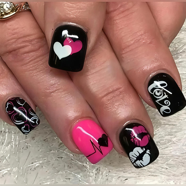 Acrylic nail design with hearts and kiss motifs Stornfield
