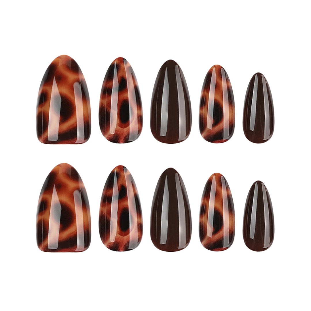 Artful stiletto nails with elegant leopard pattern Stornfield