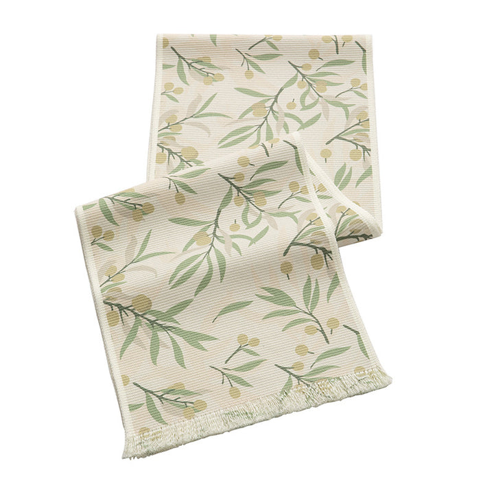 Woven table runner with floral jacquard pattern and fringed edge Stornfield