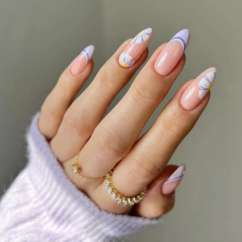 Artistic nail art with flower and ombre effects Stornfield