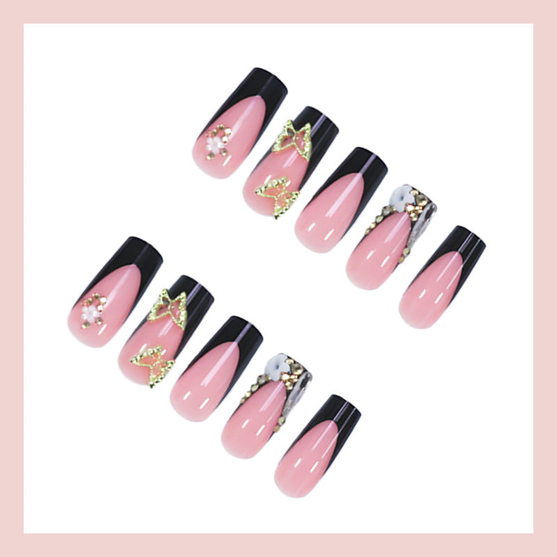 Creative nail art set with romantic floral designs and glamorous accents Stornfield