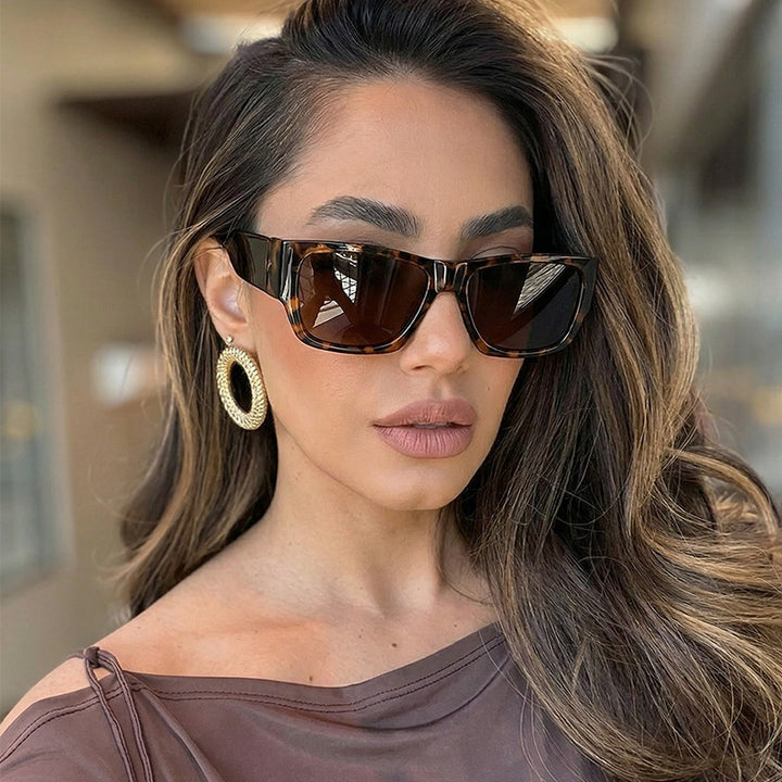 Women trendy sunglasses in minimalist design Stornfield