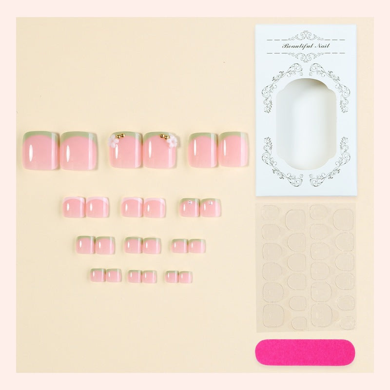 Nail art set with delicate flower designs and glossy finish Stornfield