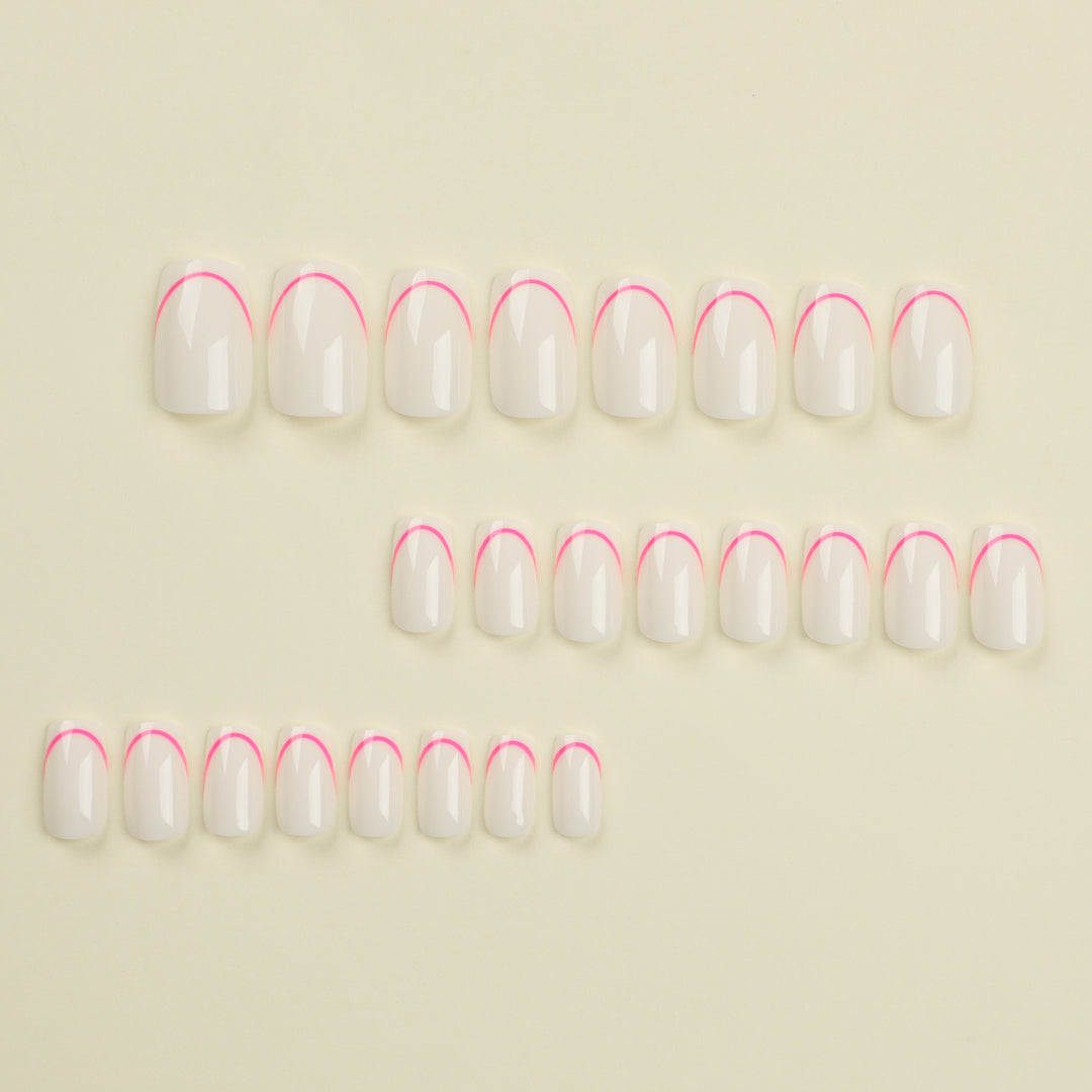 Stylish artificial nails with elegant French tip and modern accents Stornfield