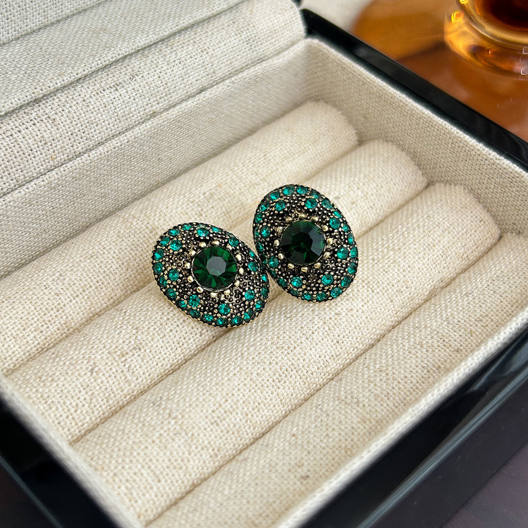 Sparkling stud earrings with intricate details Stornfield