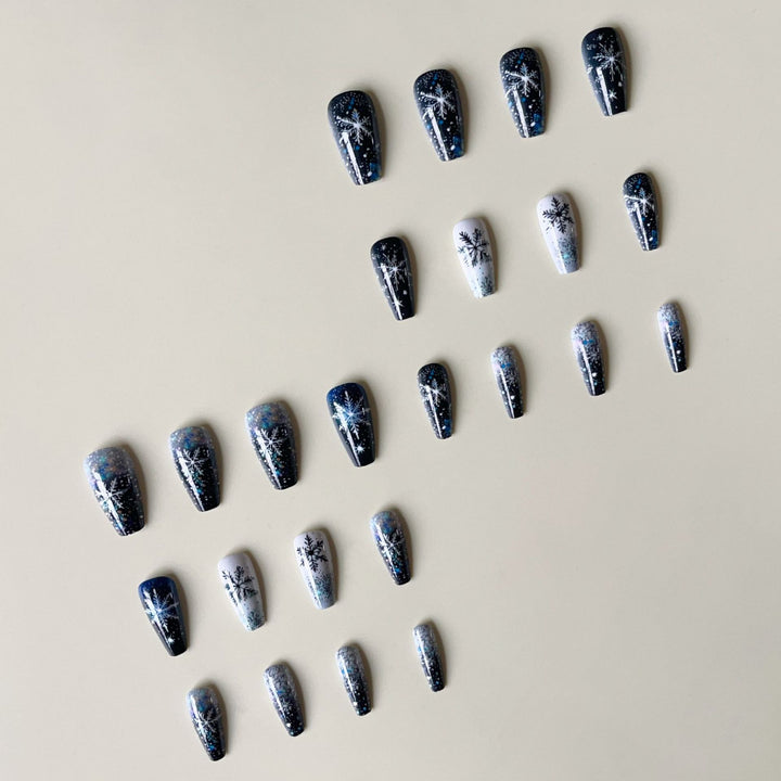 Nail art set with sparkling snowflakes and glitter accents Stornfield