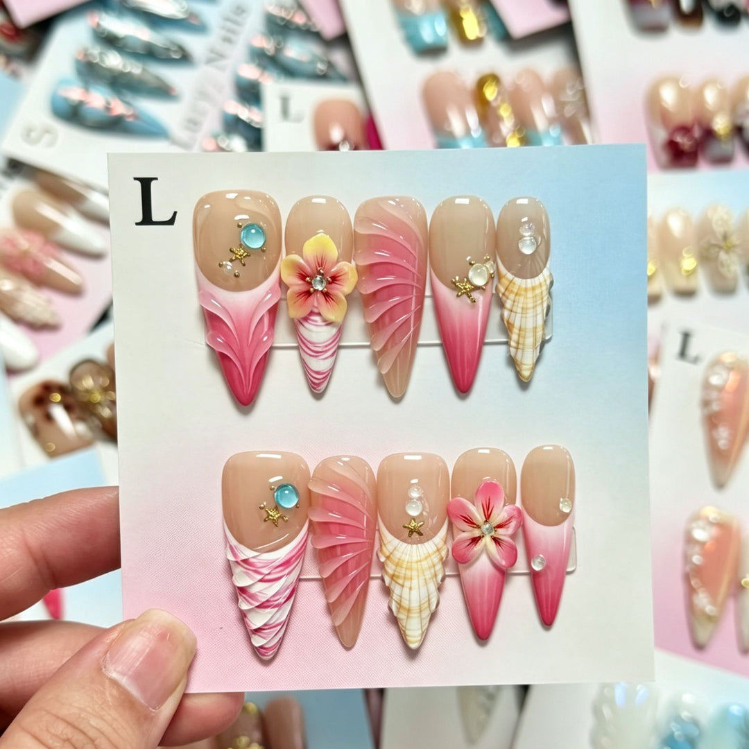 Artistic Press-On Nail Set with Floral and Shell Accents