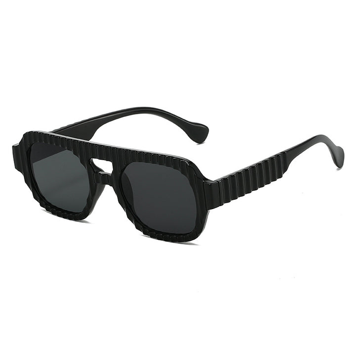 Ladies fashionable sunglasses in futuristic design with textured frame Stornfield