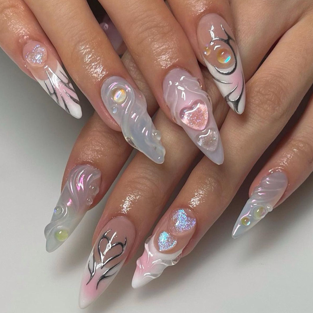 Artful nail extensions with two-dimensional design and glitter accents Stornfield