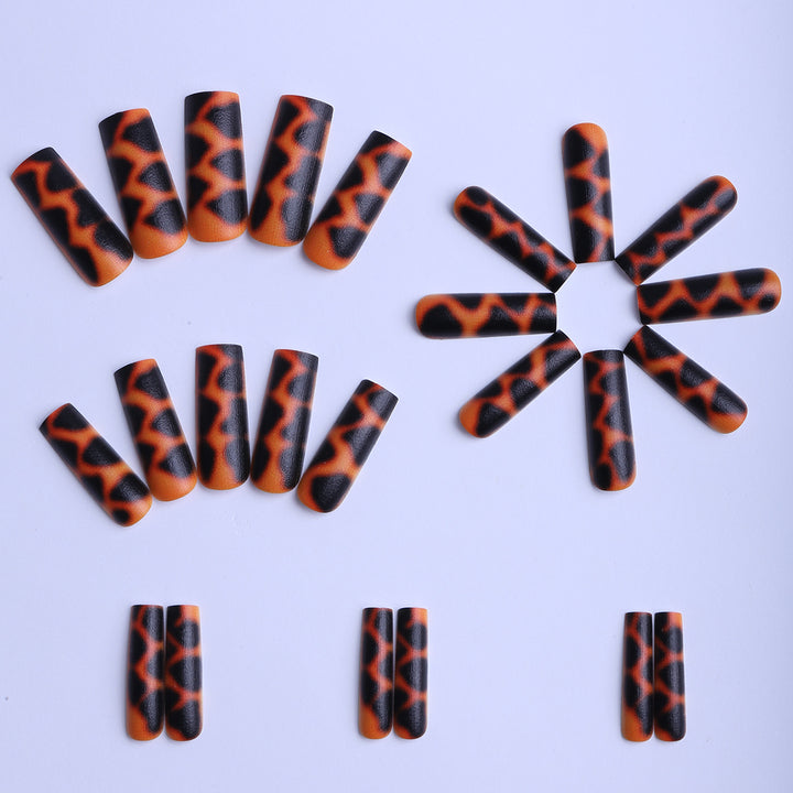Artificial nails in creative leopard design Stornfield