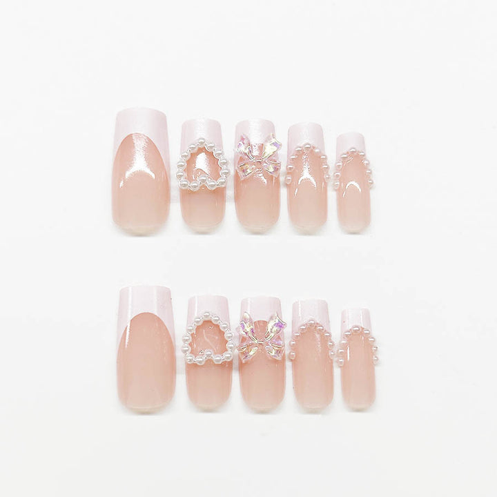 Acrylic nail set with elegant pearl and 3D flower decorations Stornfield