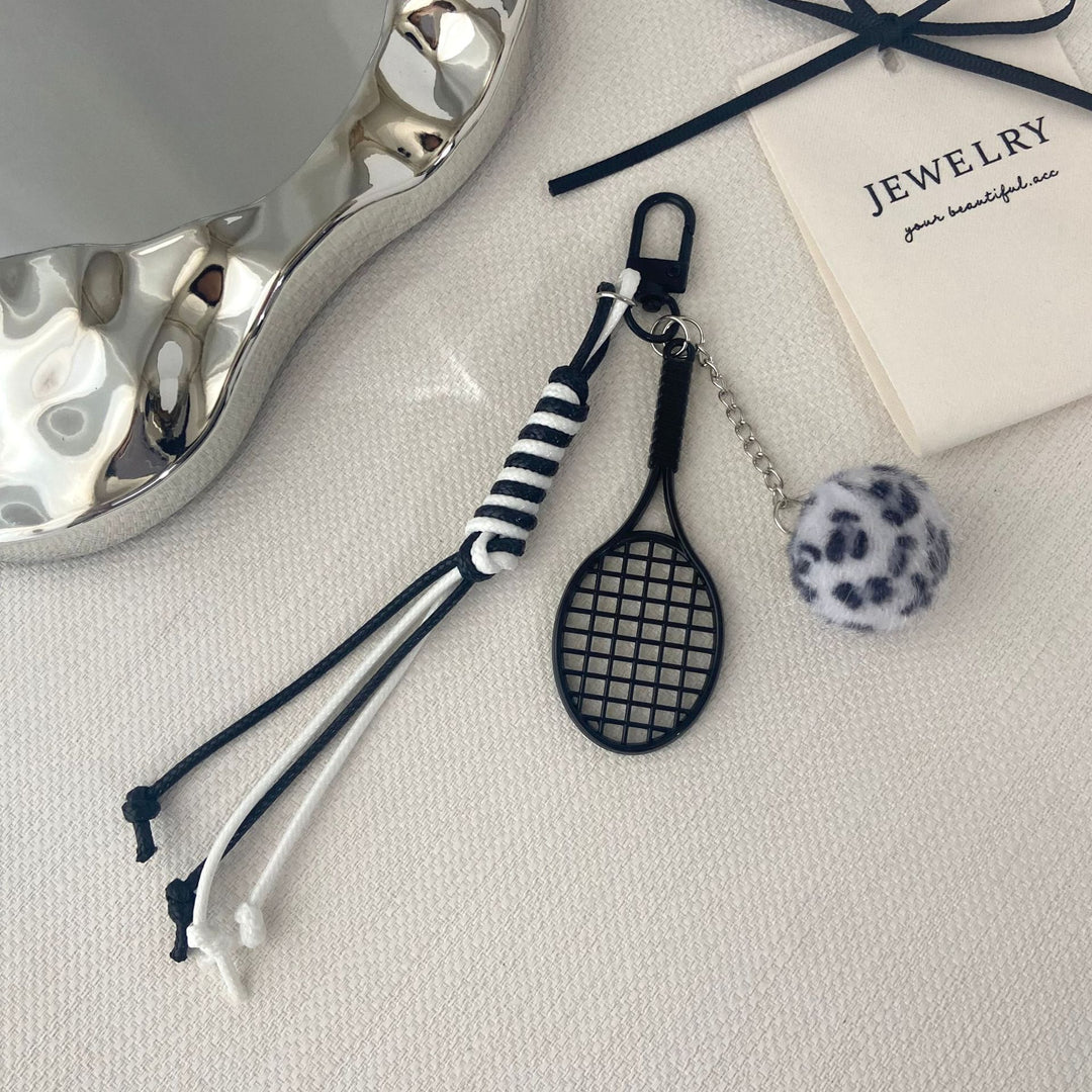 Tennis Racket and Fur Ball Keychain Stornfield