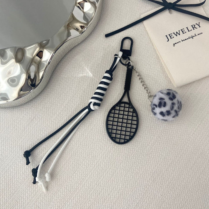 Tennis Racket and Fur Ball Keychain Stornfield