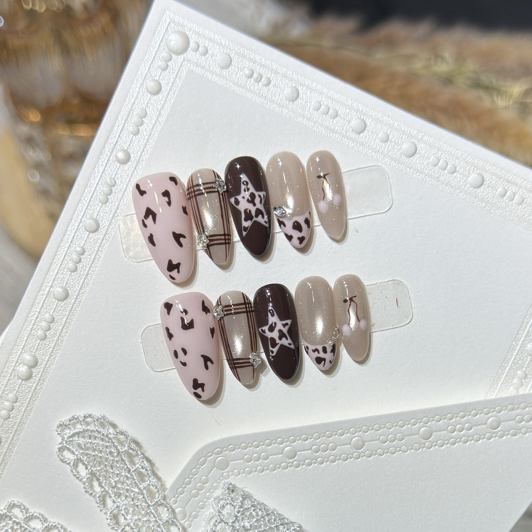 Artistic Press-On Nail Art Set with Unique Pattern Designs Stornfield