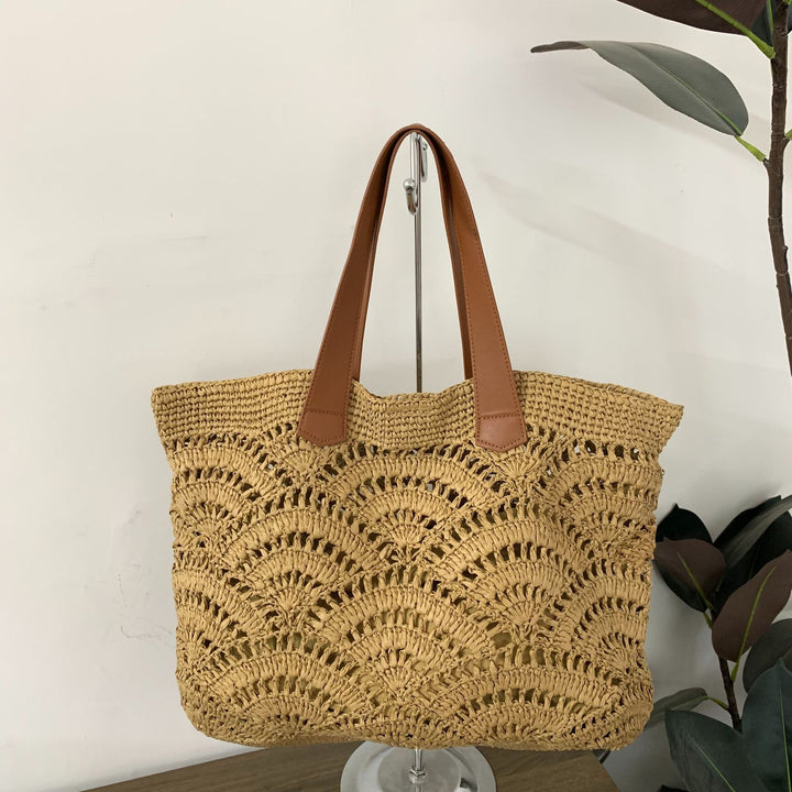 Handbag made of high-quality woven natural material with elegant leather handles Stornfield