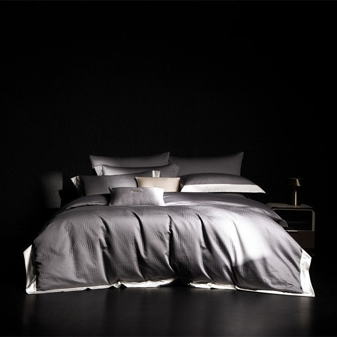 Satin bed linen set with reversible function, extra soft shine and contrasting trim