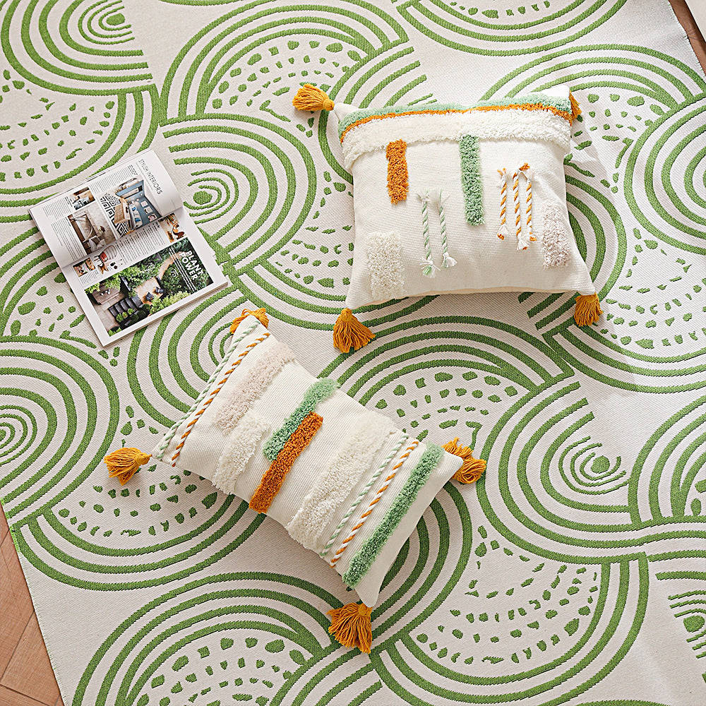 Decorative cotton cushion with hand-tufted relief and decorative tassels Stornfield