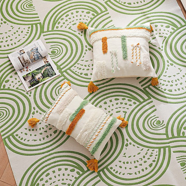 Decorative cotton cushion with hand-tufted relief and decorative tassels Stornfield